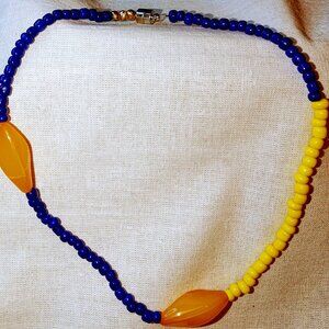 New seed bead choker style necklace made of blue and yellow gold tone